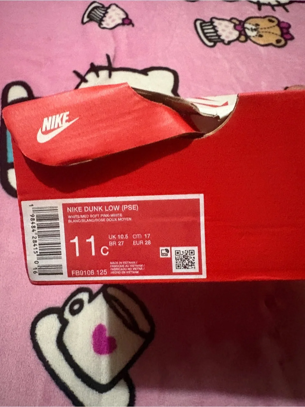 Nike Pink and White Low-Top Sneaker